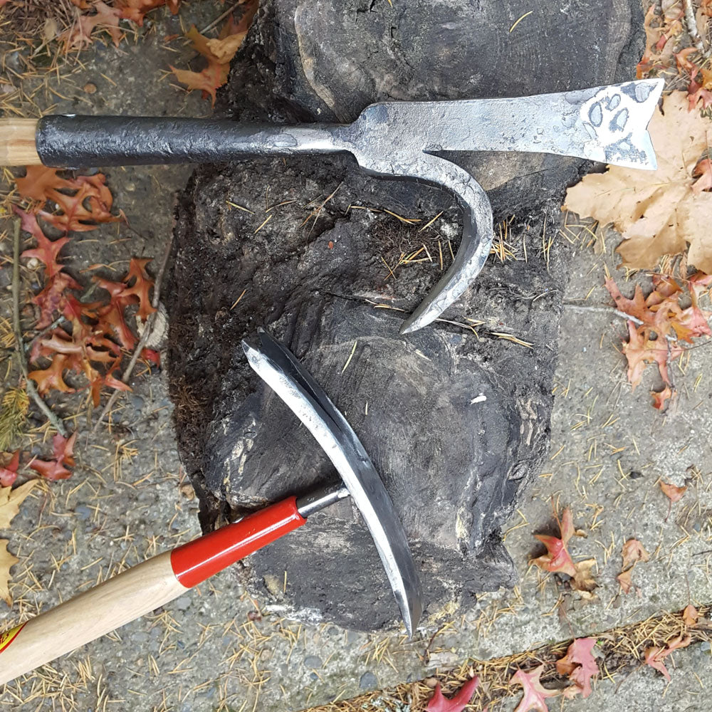 Abbott weeder next to the hand forged berry hook.