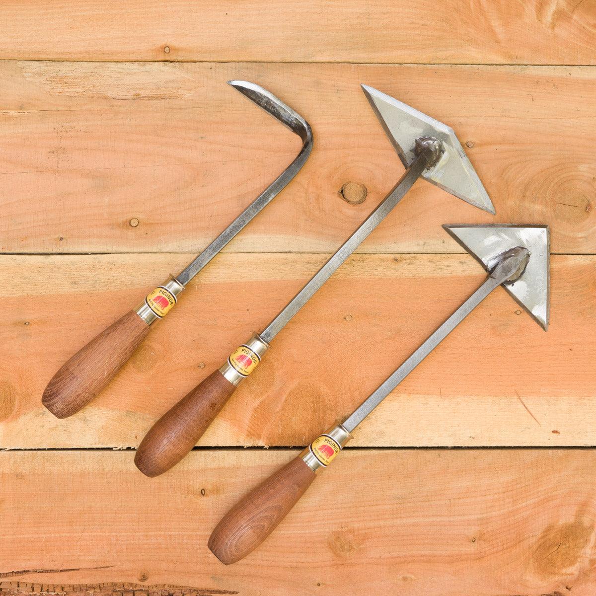 From left to right: Cape Cod Weeder, Diamond Hoe, Arrow Weeder