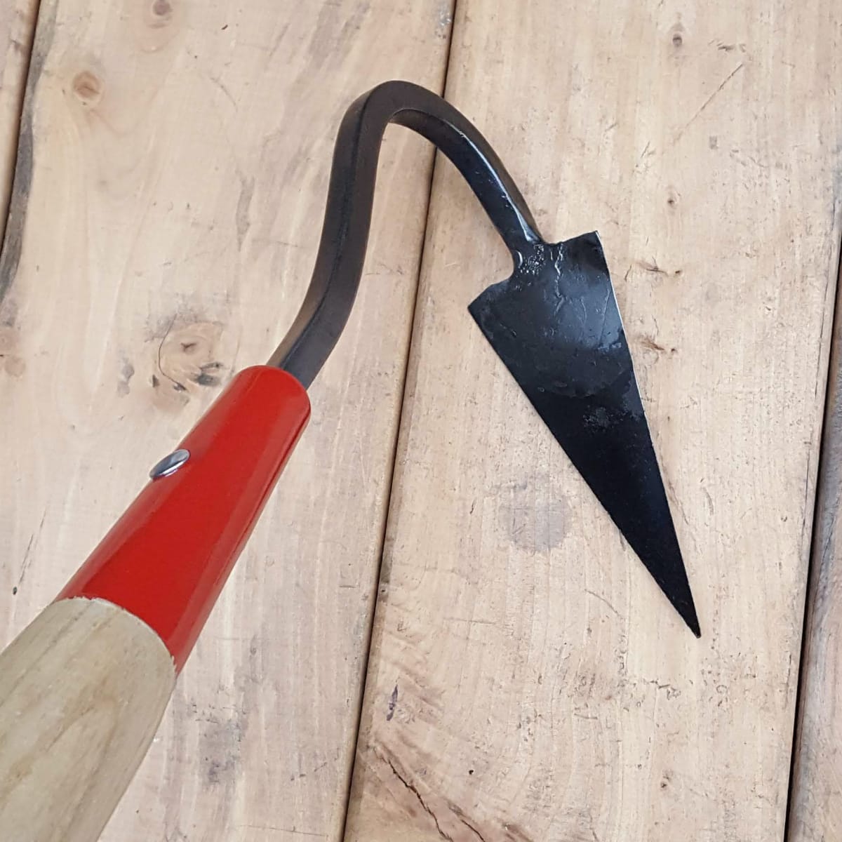 The long V or triangular shaped head is approximately 6 inches long and can also be order with a tang-and-ferrule connection, pictured here.